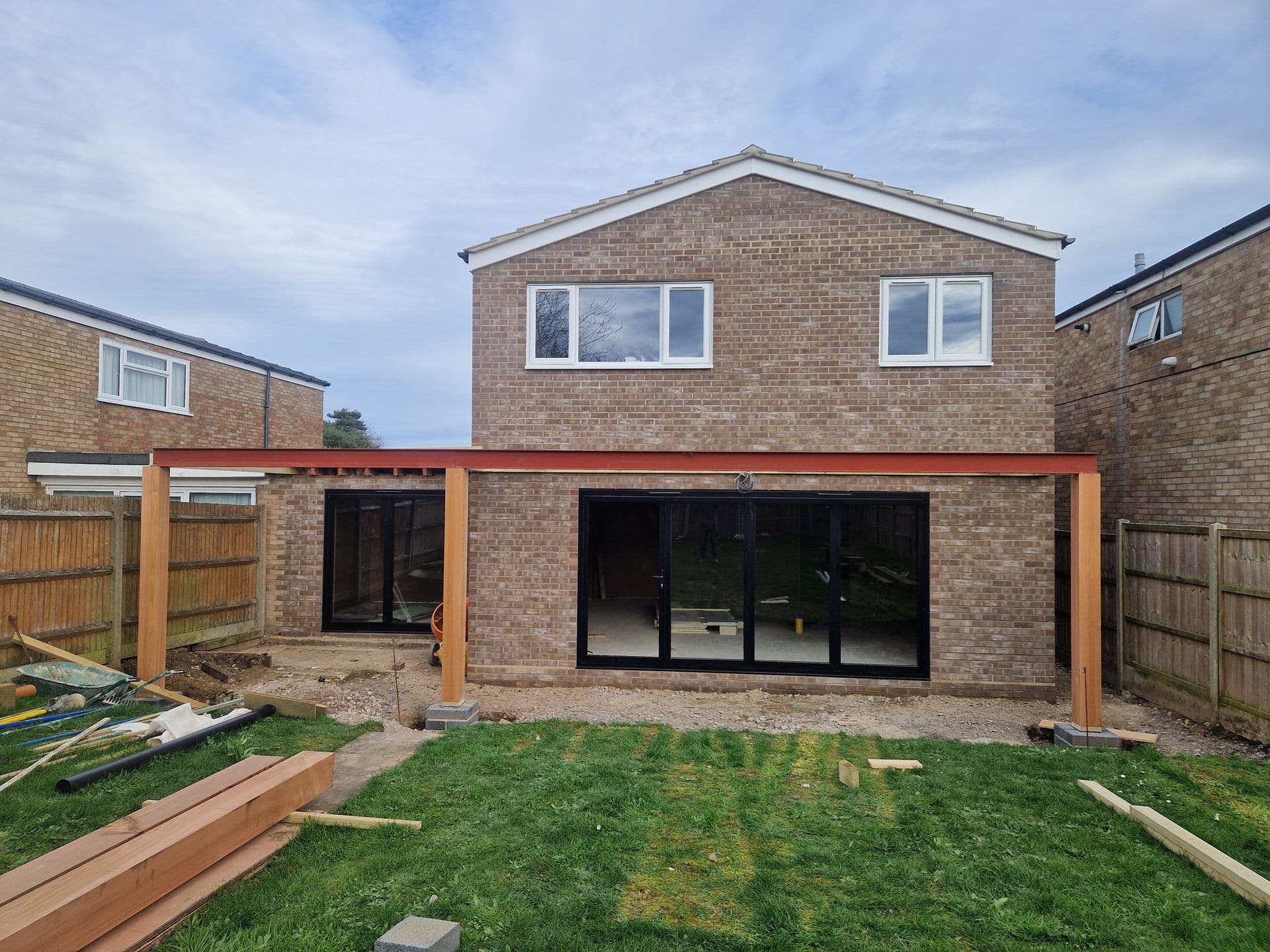 Rear extension with steel beam and bi-fold door opening during a DNR Build project
