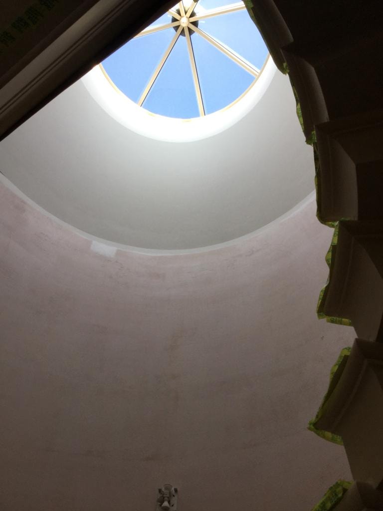 Domed cupola rooflight finished in curved plasterwork drawing daylight into the home by DNR Build