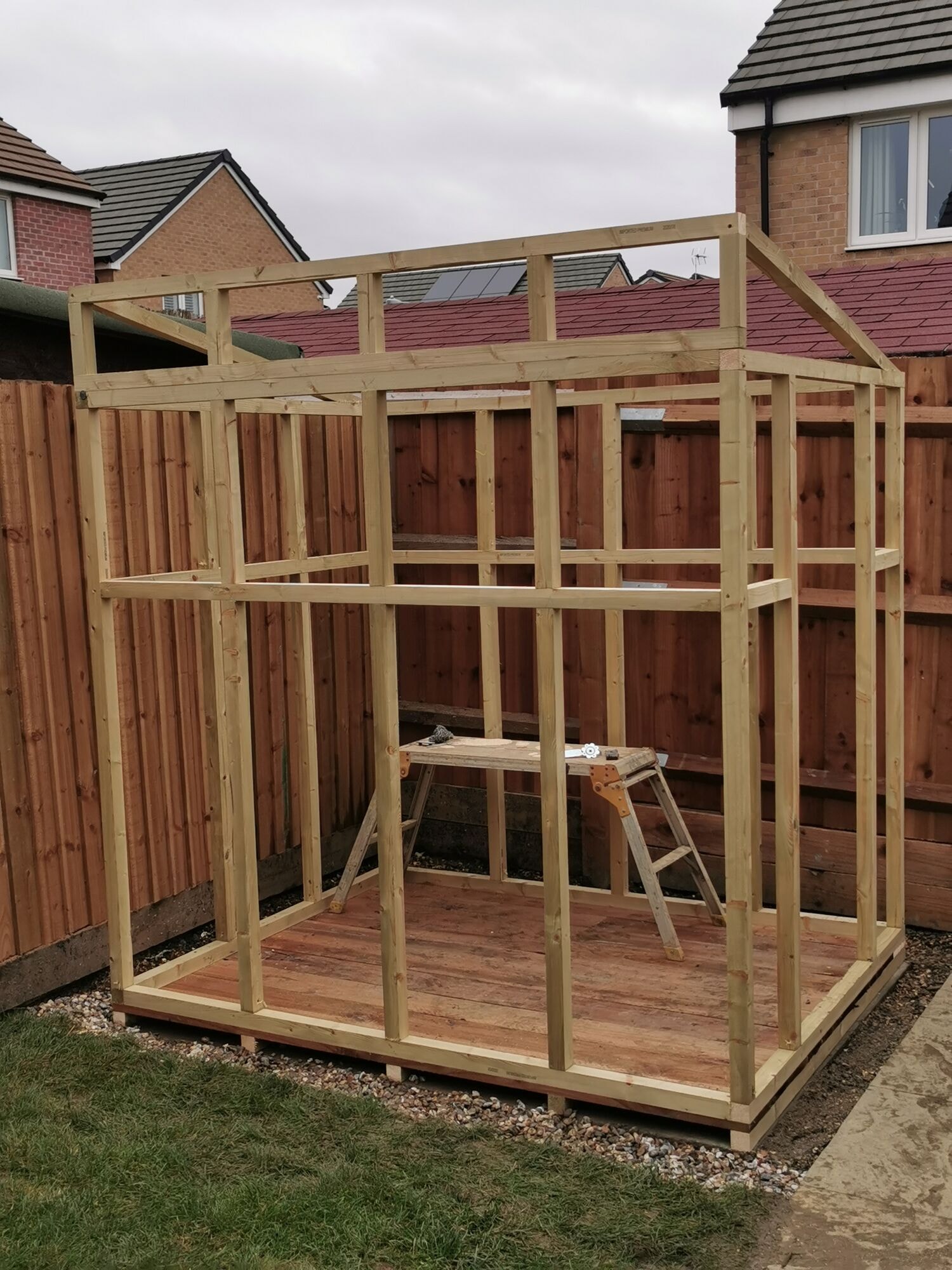 The bespoke timber shed frame built and squared up on its concrete base by DNR Build