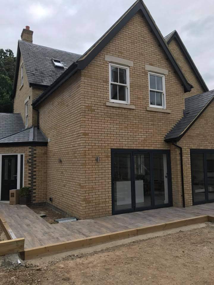 The rear of the home with the new patio part laid and ground prepared during the build by DNR Build