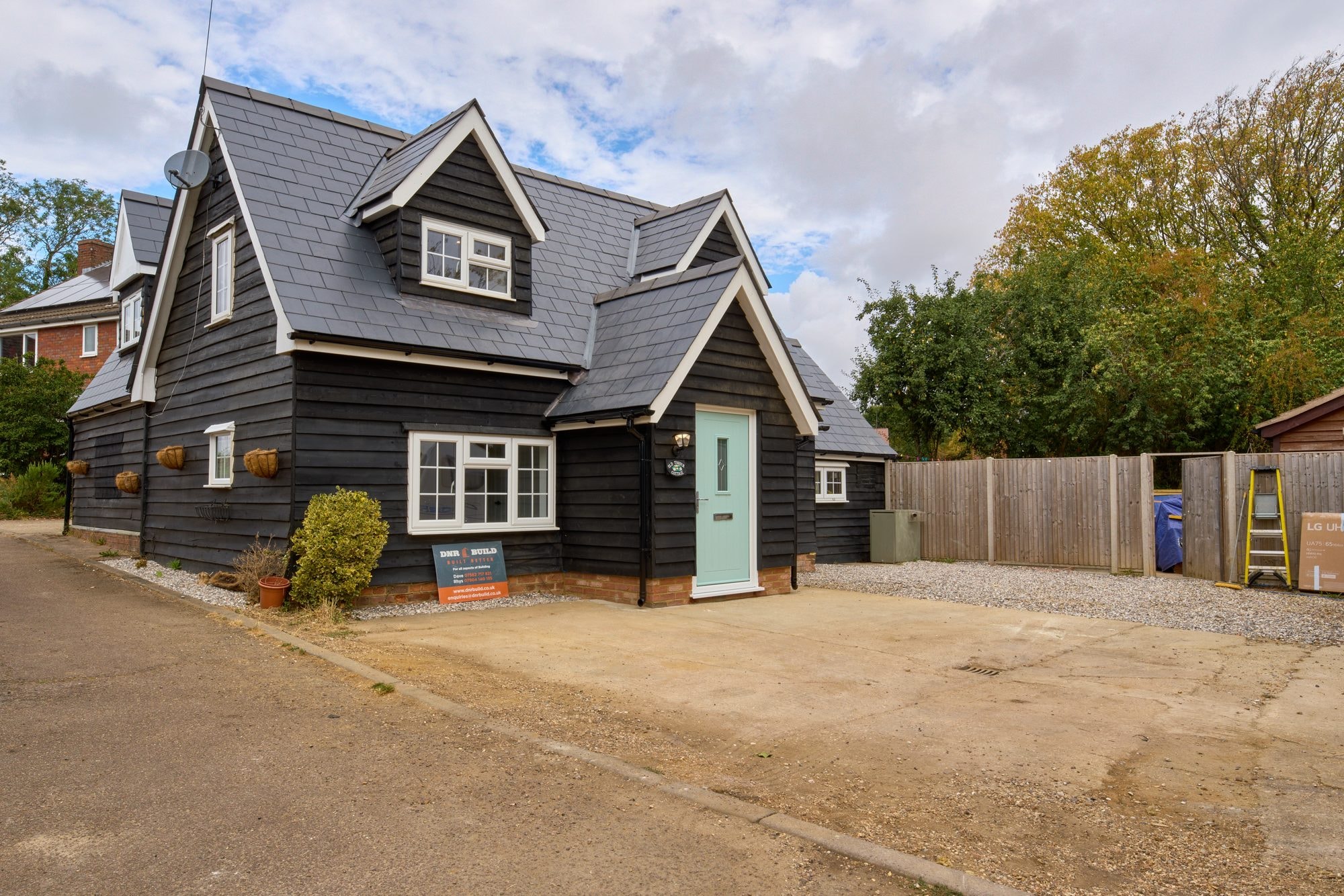 The finished exterior, roof and patio of the Old Timber Cottage in Stevenage by DNR Build (4 of 10)