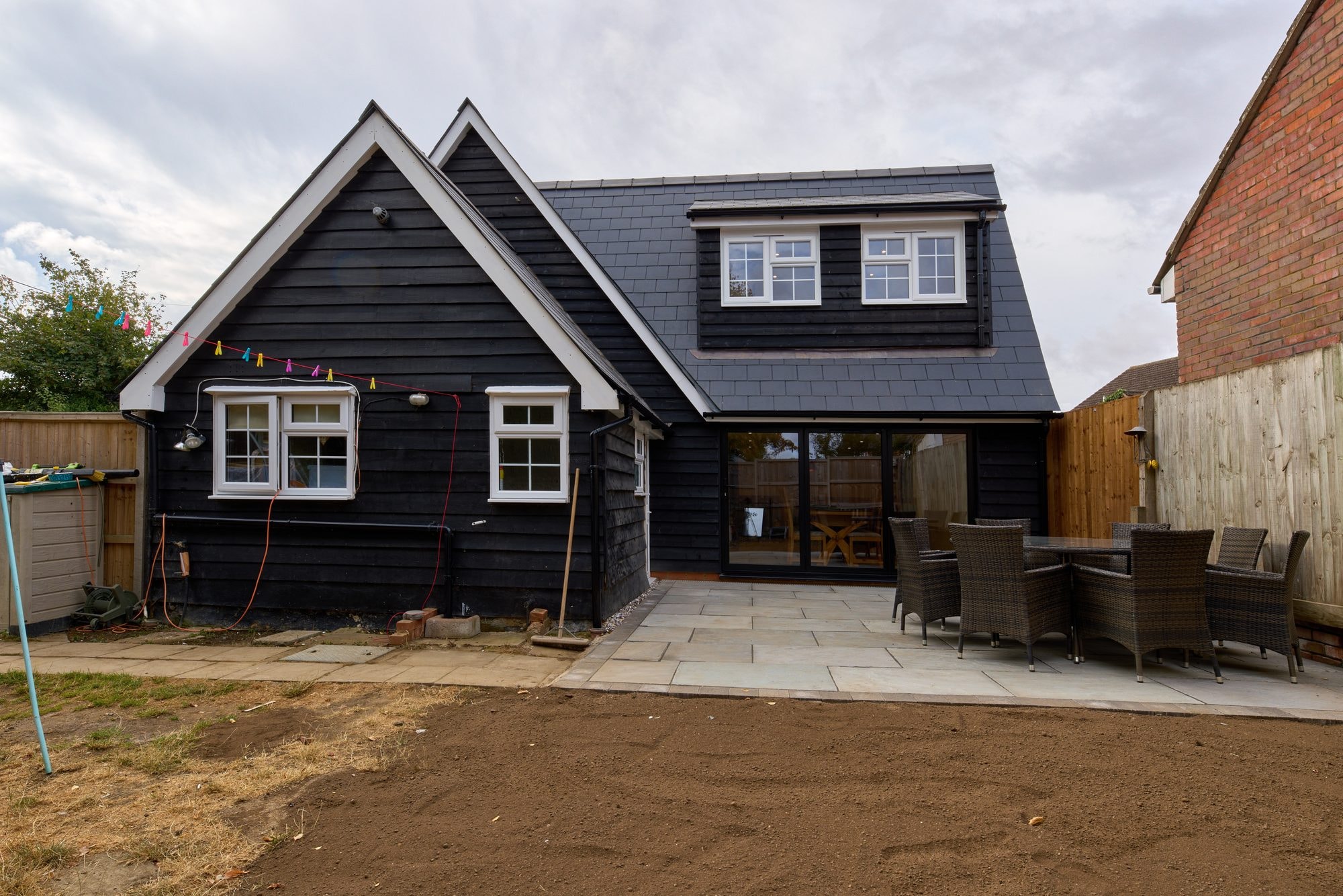 The finished exterior, roof and patio of the Old Timber Cottage in Stevenage by DNR Build (7 of 10)