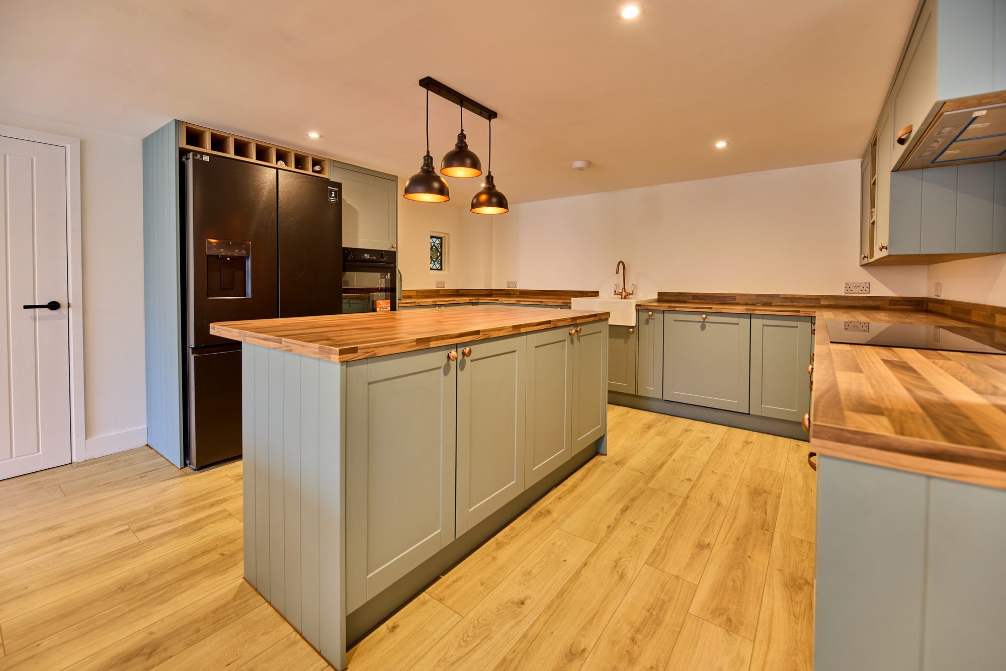 The new open plan kitchen and dining room at the Old Timber Cottage in Stevenage by DNR Build (2 of 10)