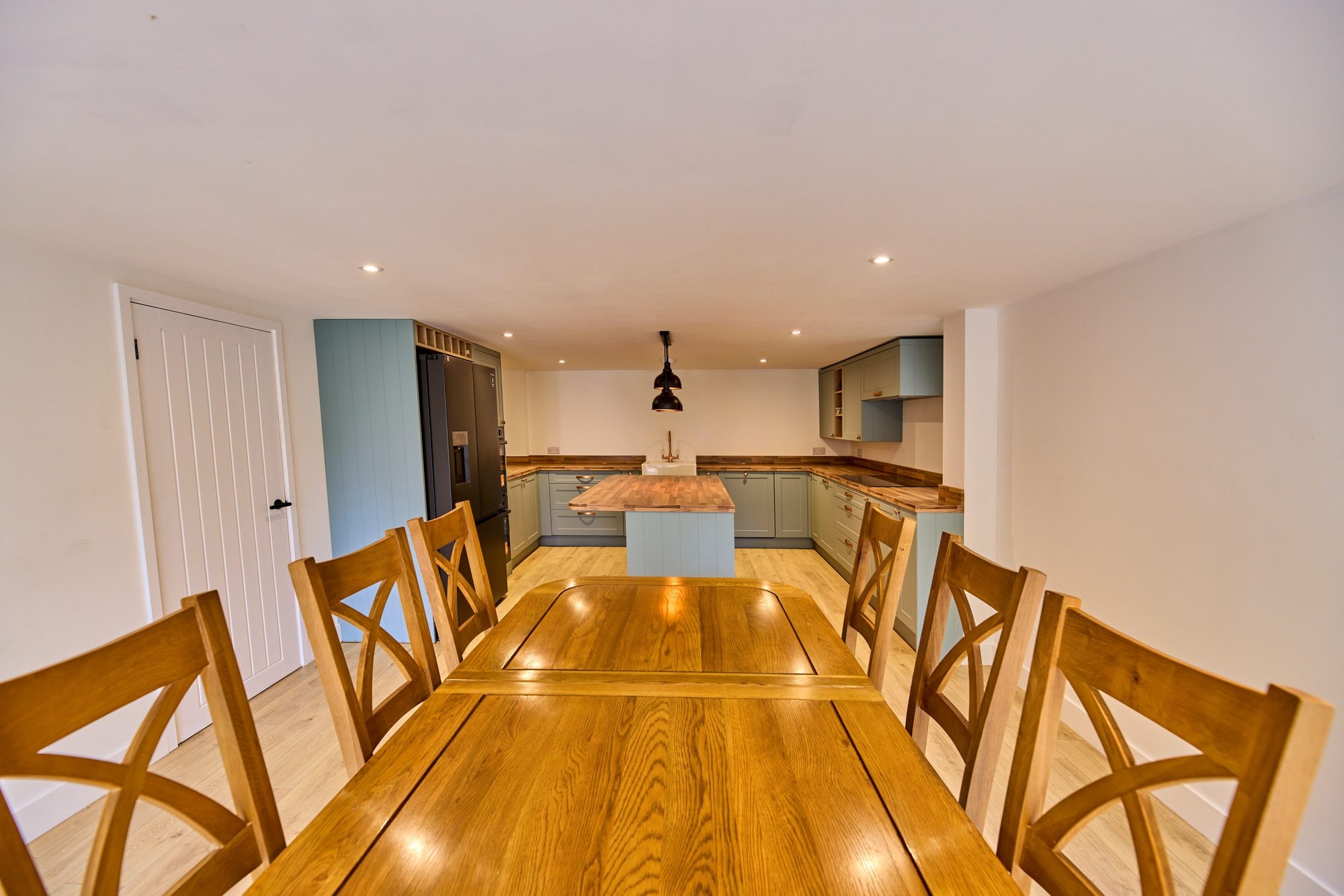The new open plan kitchen and dining room at the Old Timber Cottage in Stevenage by DNR Build (4 of 10)