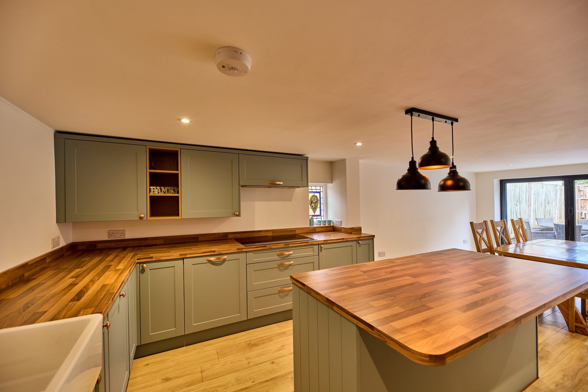 The new open plan kitchen and dining room at the Old Timber Cottage in Stevenage by DNR Build (7 of 10)