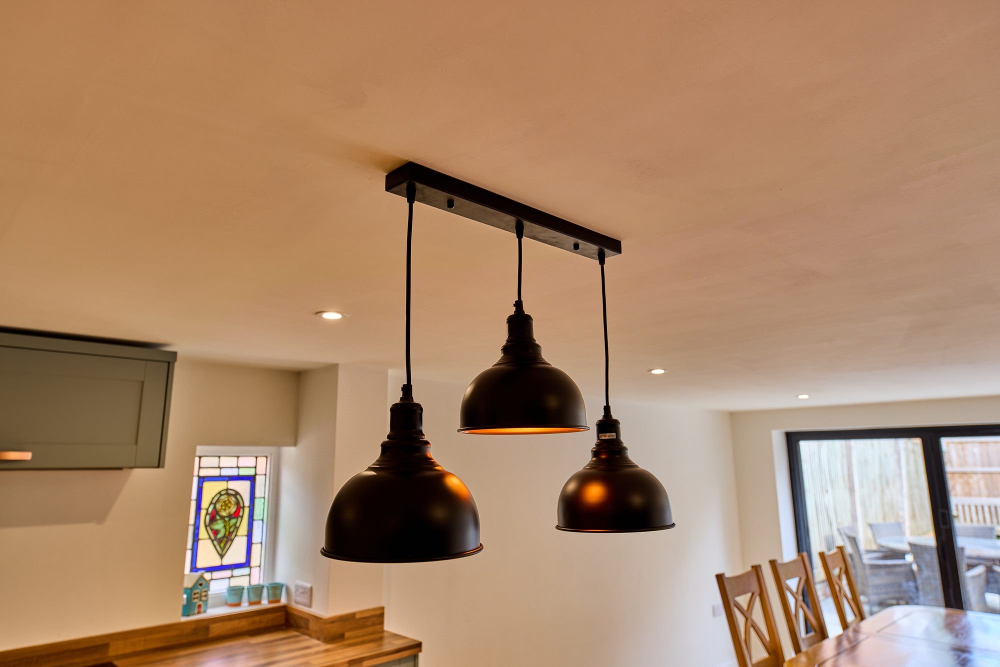 The new open plan kitchen and dining room at the Old Timber Cottage in Stevenage by DNR Build (10 of 10)