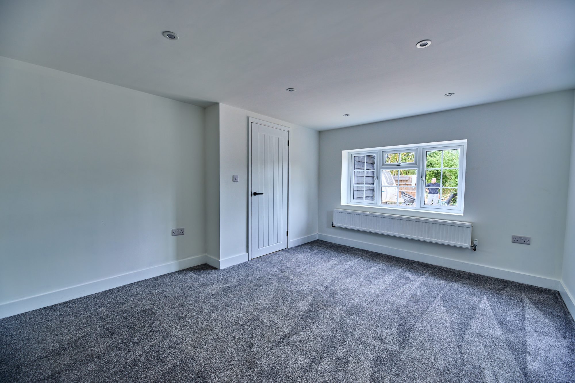 The renovated hallway, staircase and living rooms at the Old Timber Cottage in Stevenage by DNR Build (8 of 10)