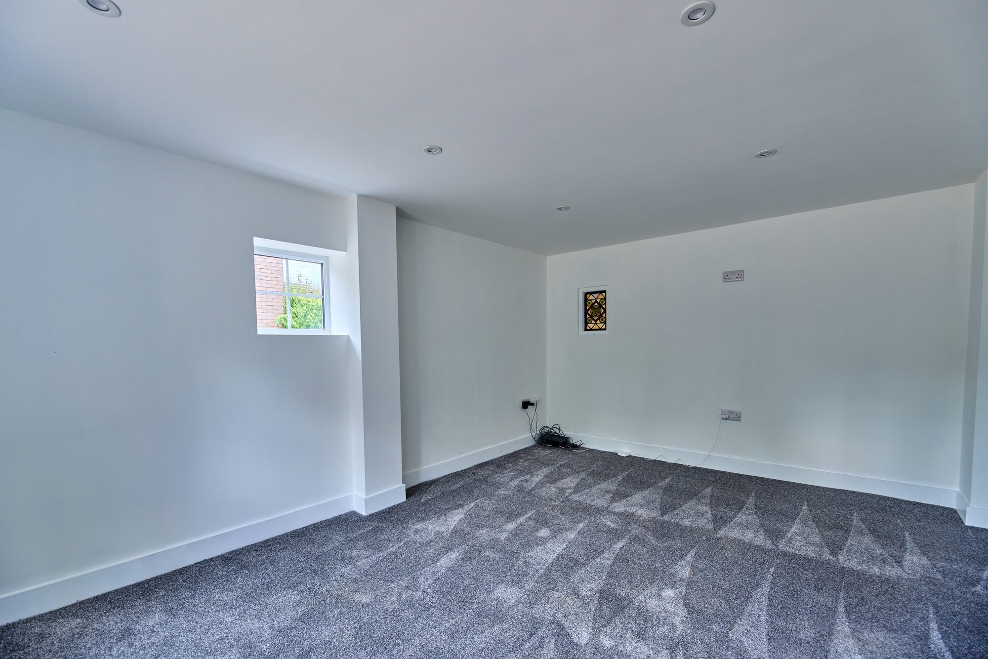 The renovated hallway, staircase and living rooms at the Old Timber Cottage in Stevenage by DNR Build (10 of 10)