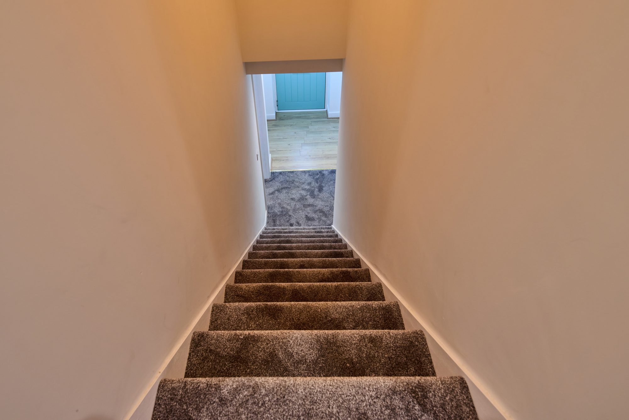 The renovated hallway, staircase and living rooms at the Old Timber Cottage in Stevenage by DNR Build (4 of 10)