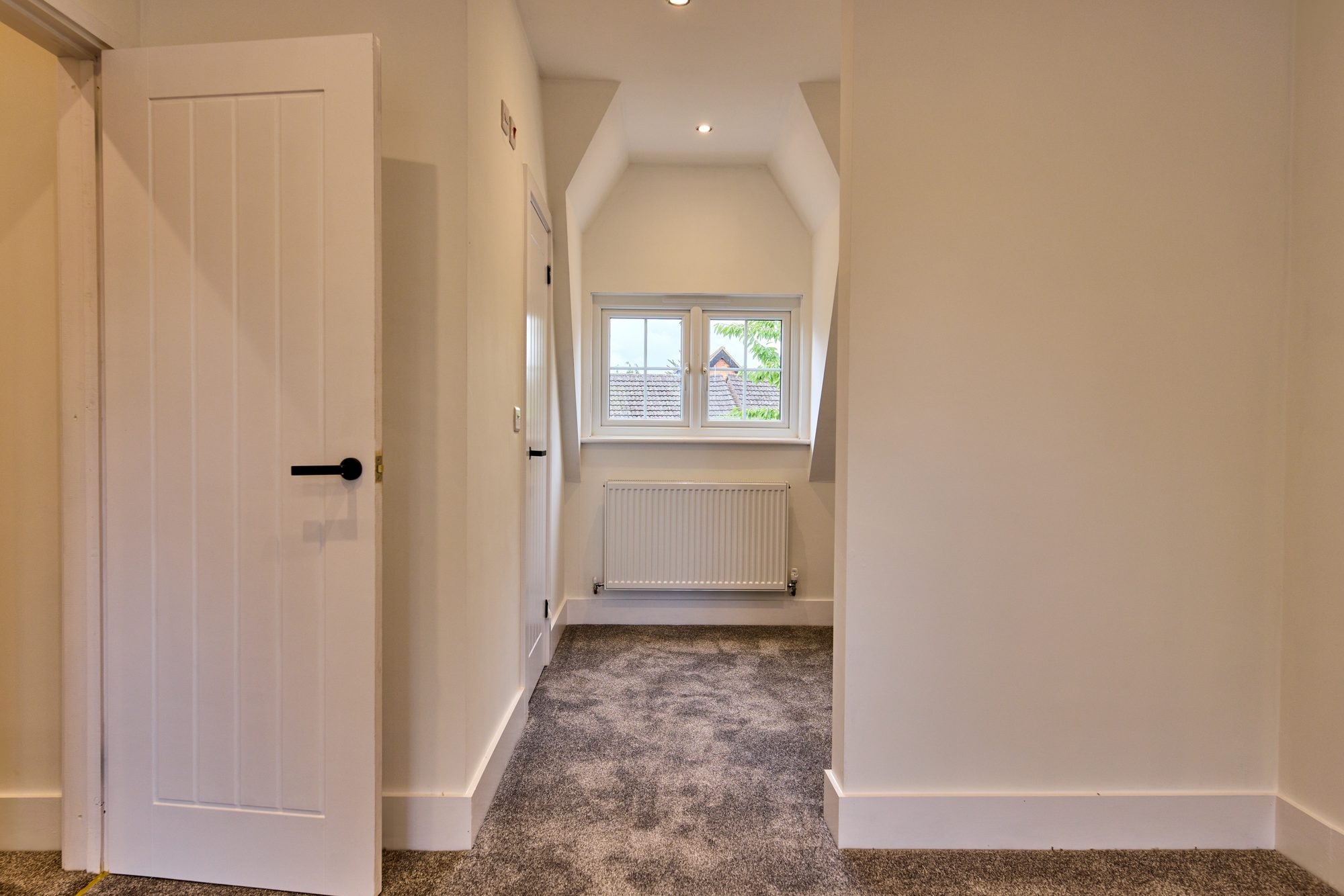 The renovated bedrooms, landing and shower room at the Old Timber Cottage in Stevenage by DNR Build (15 of 20)