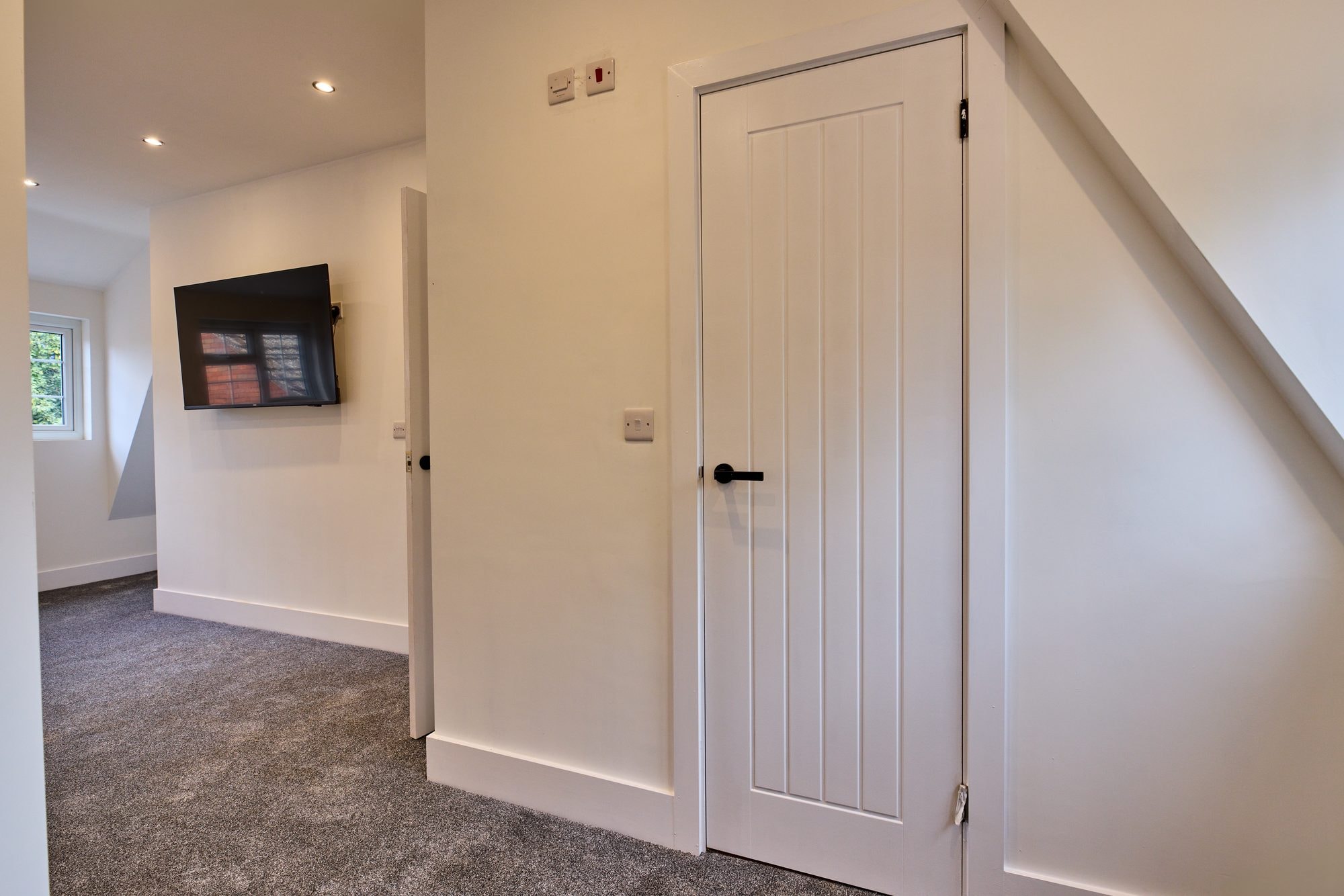 The renovated bedrooms, landing and shower room at the Old Timber Cottage in Stevenage by DNR Build (16 of 20)