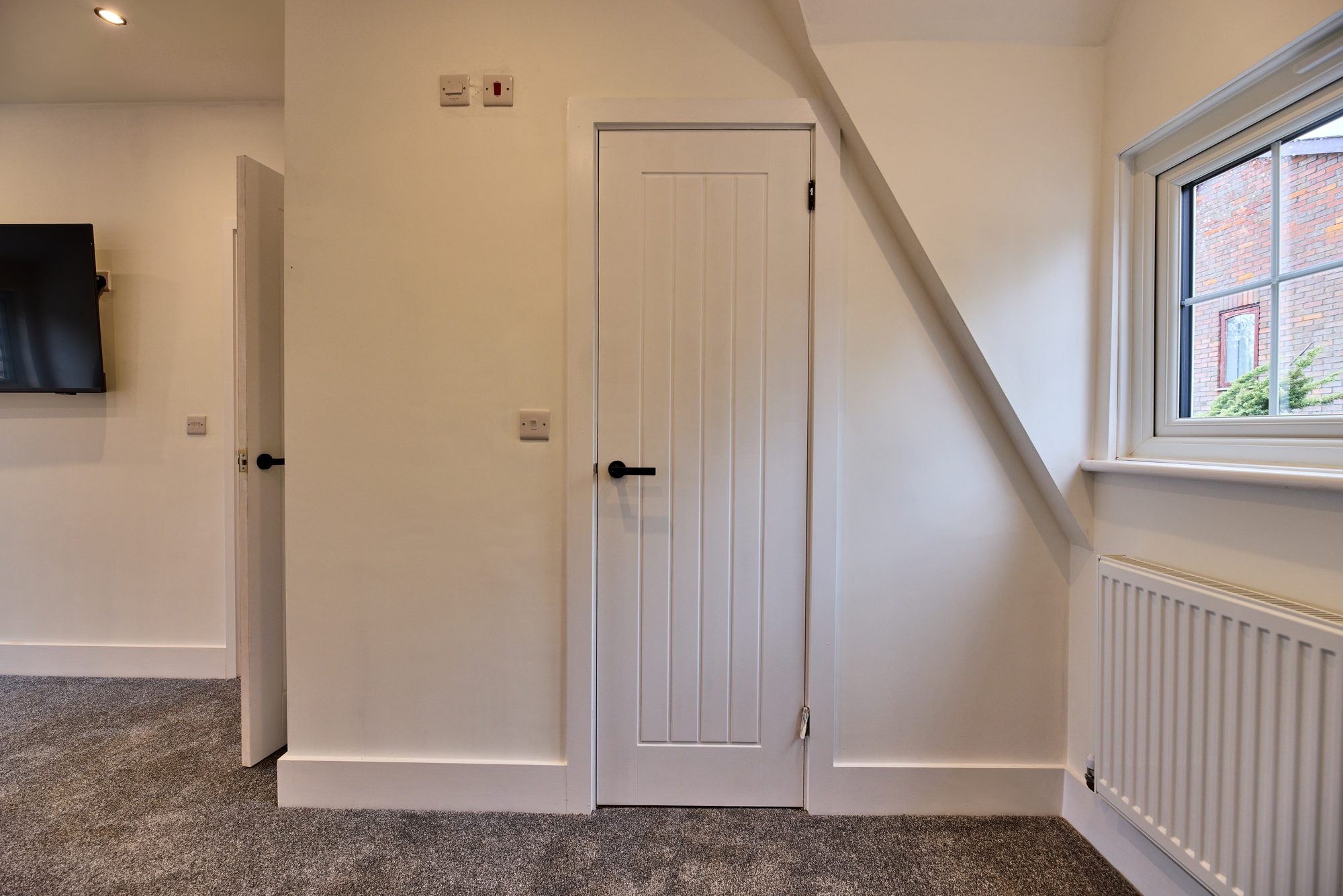 The renovated bedrooms, landing and shower room at the Old Timber Cottage in Stevenage by DNR Build (17 of 20)