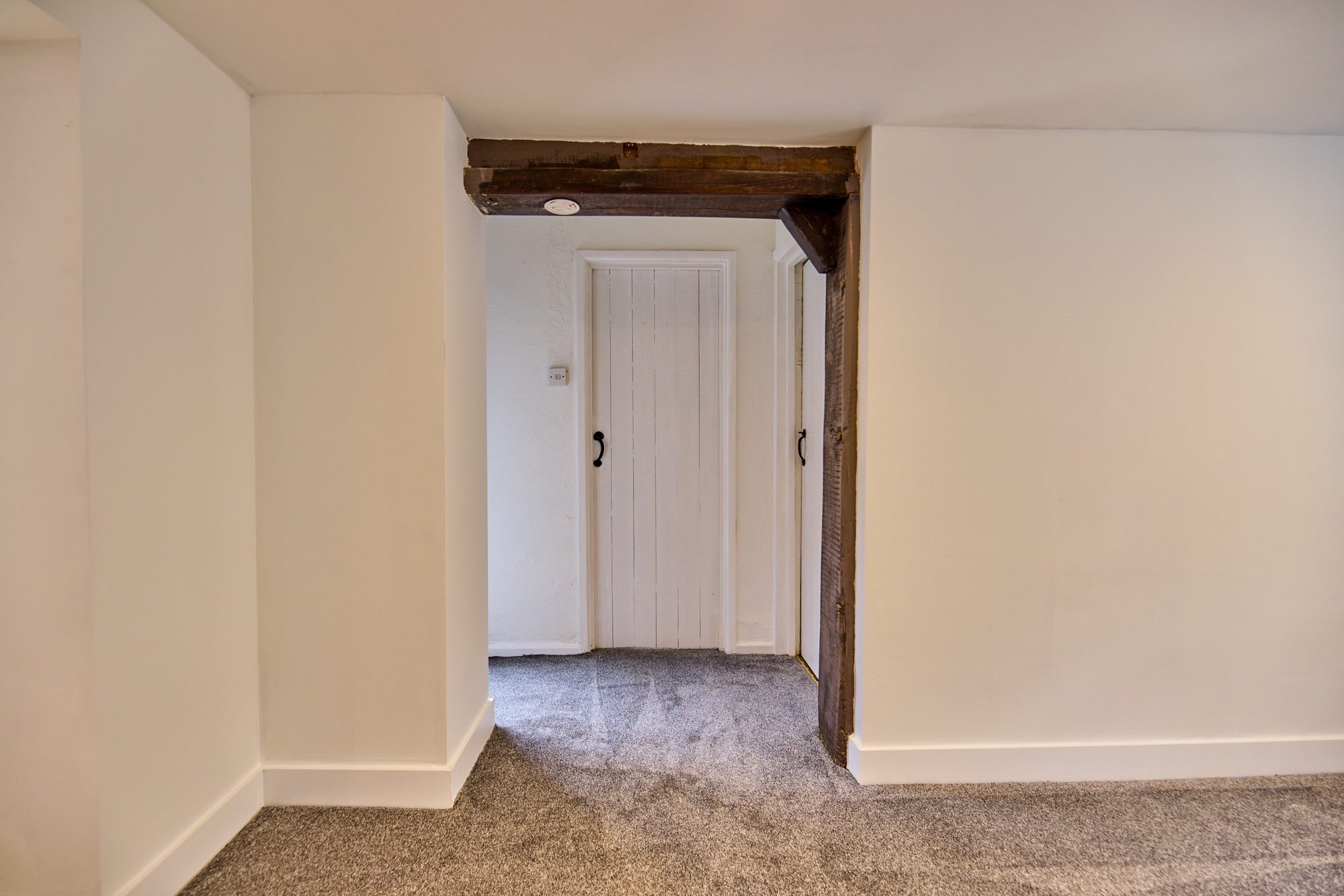 The renovated bedrooms, landing and shower room at the Old Timber Cottage in Stevenage by DNR Build (20 of 20)