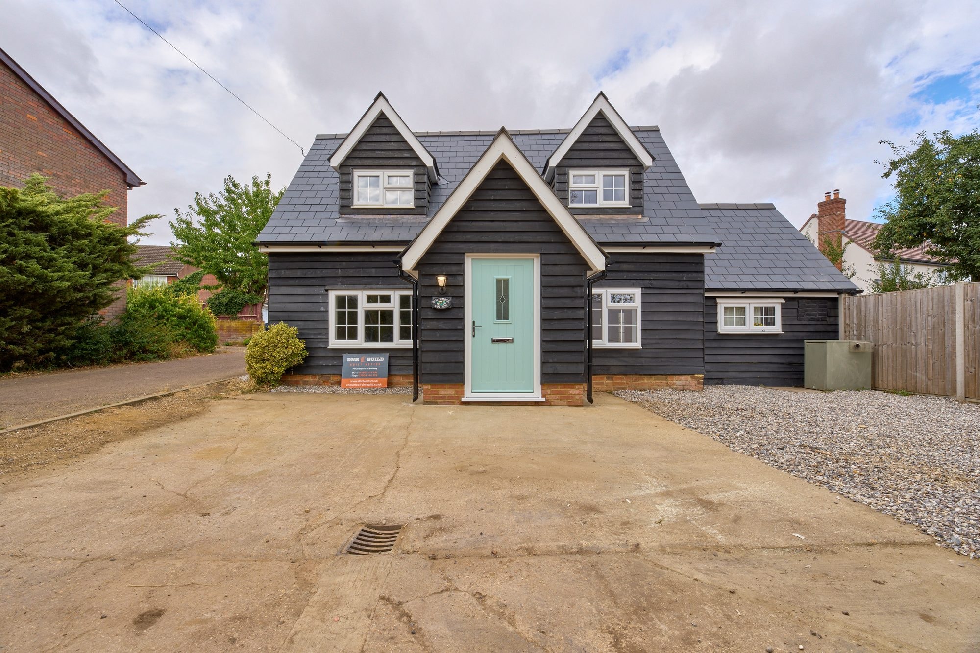 The finished exterior, roof and patio of the Old Timber Cottage in Stevenage by DNR Build (5 of 10)
