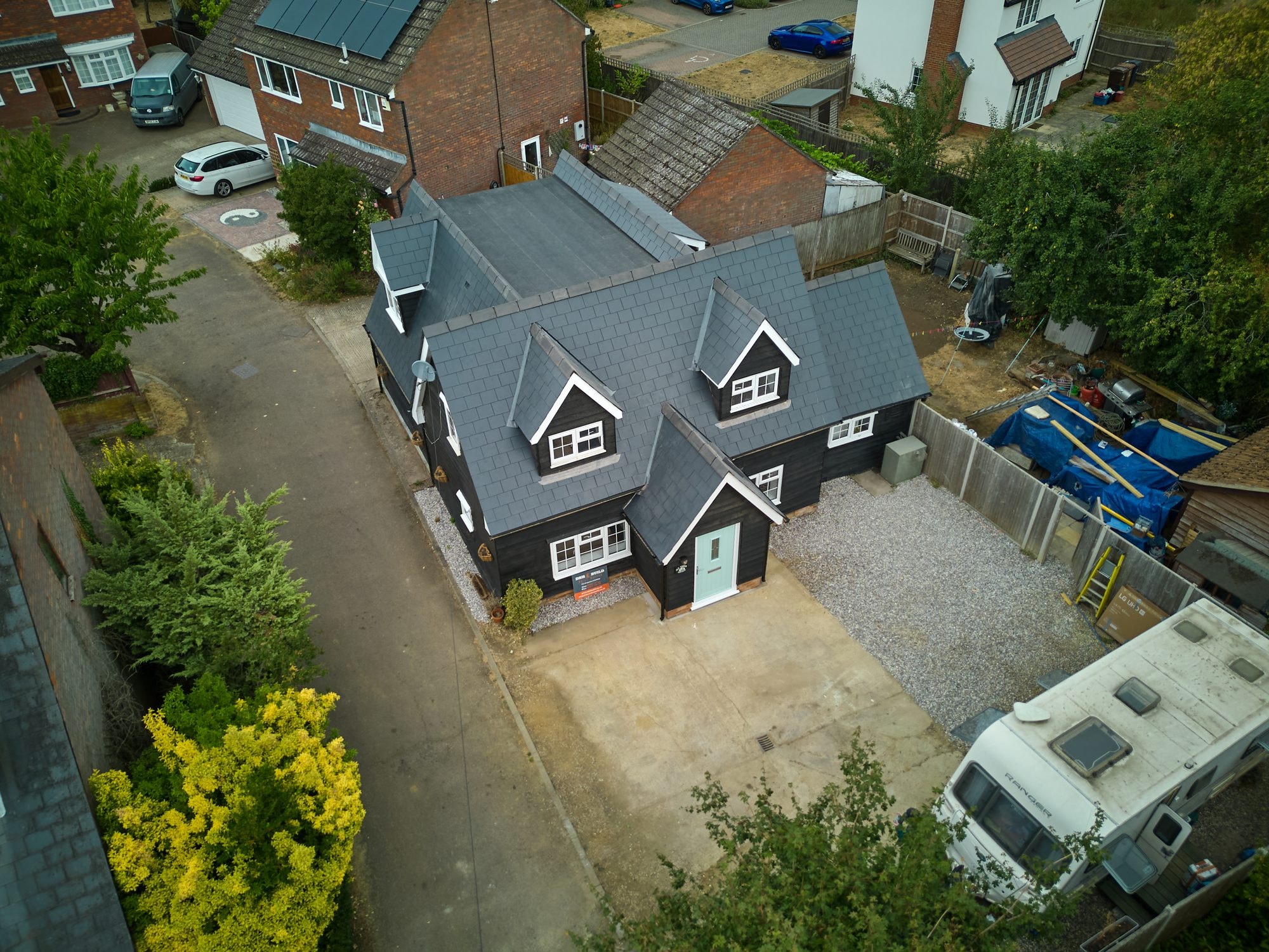 The finished exterior, roof and patio of the Old Timber Cottage in Stevenage by DNR Build (10 of 10)
