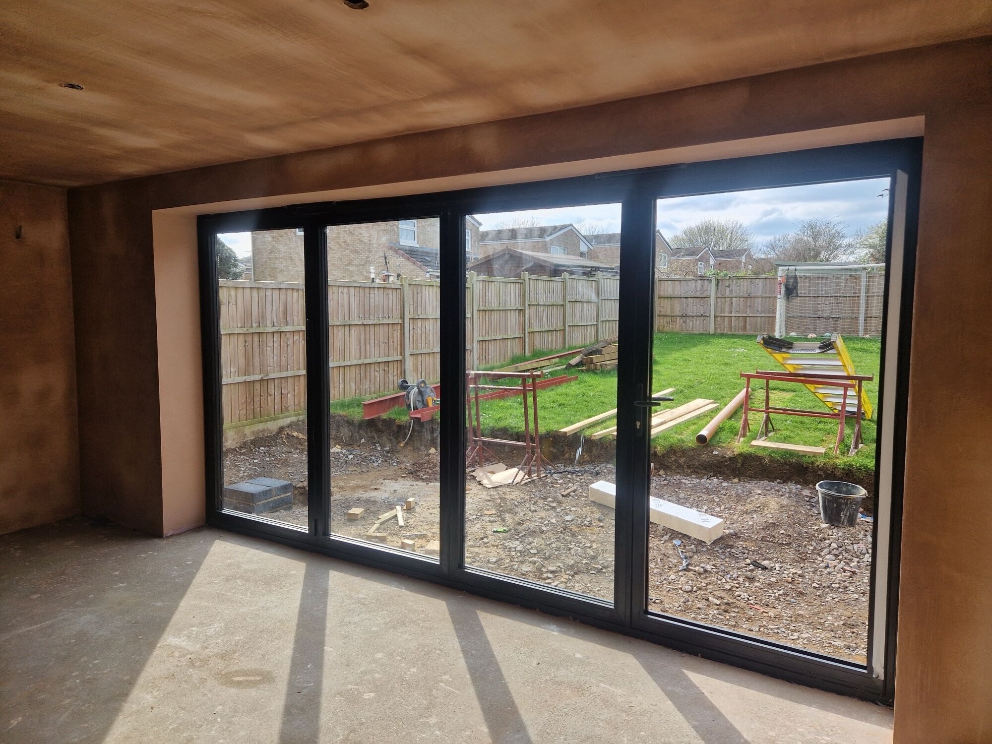 The new kitchen and open-plan family space at the Stevenage home by DNR Build (5 of 13)
