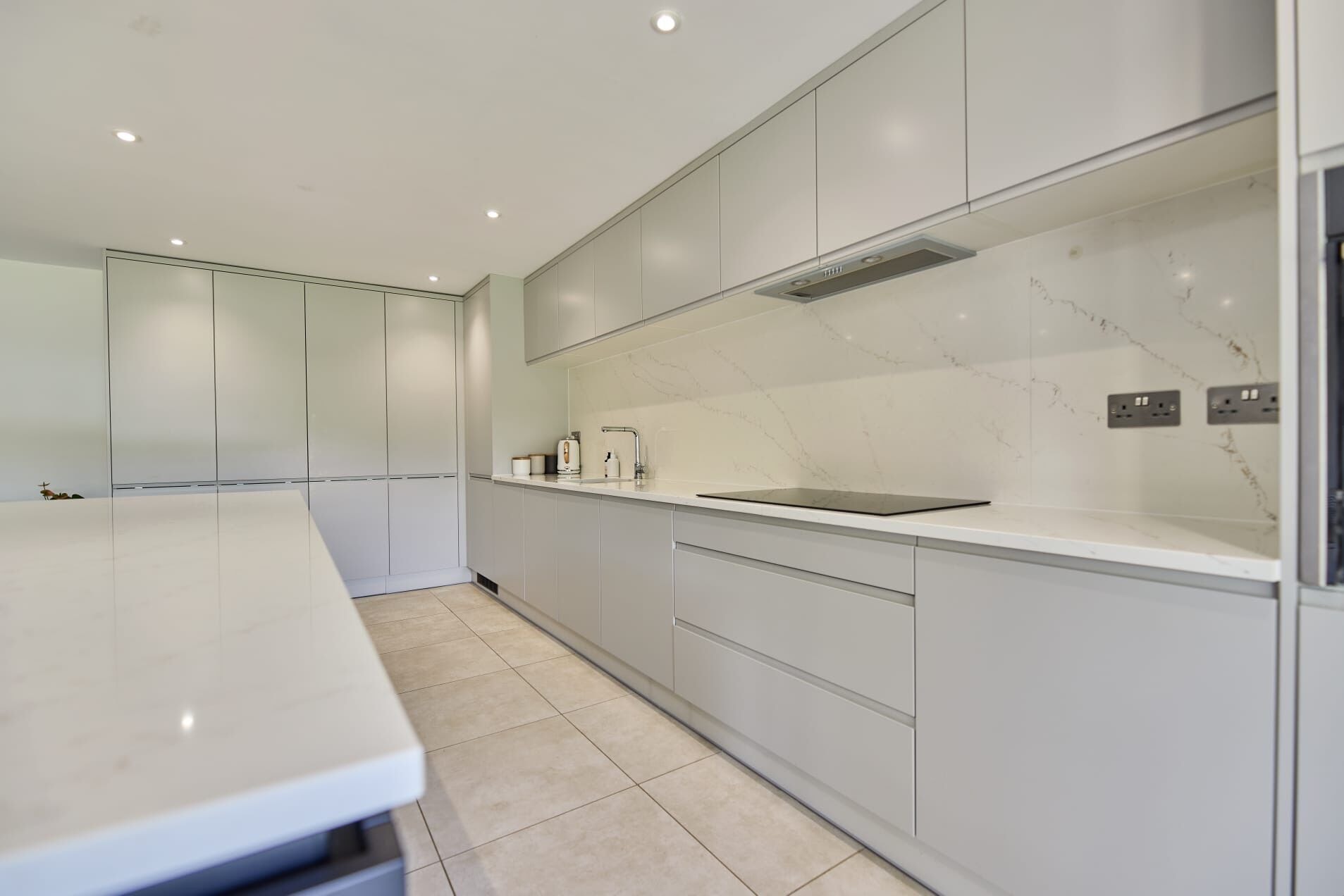 The new kitchen and open-plan family space at the Stevenage home by DNR Build (11 of 13)
