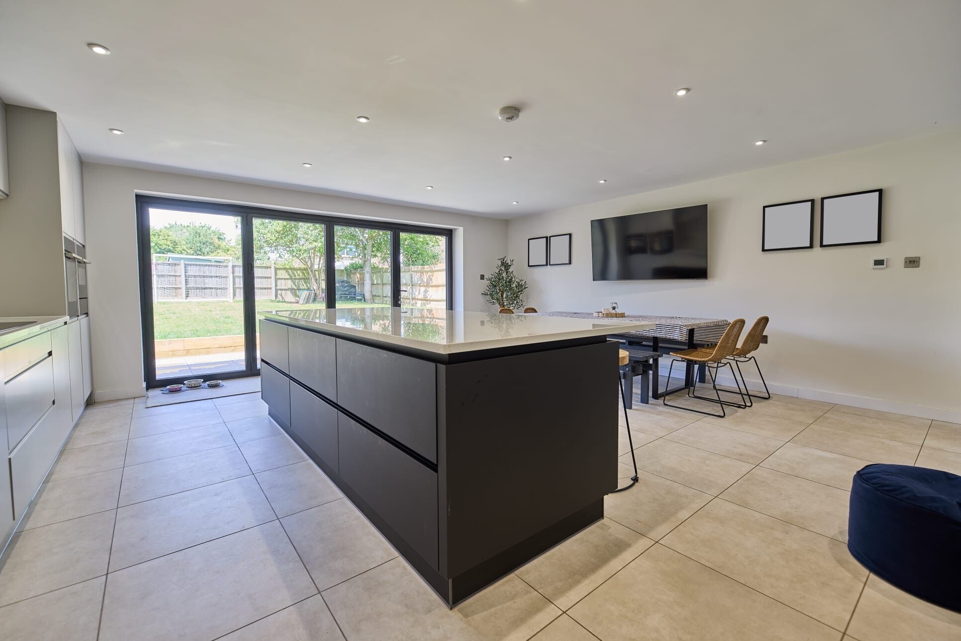 The new kitchen and open-plan family space at the Stevenage home by DNR Build (13 of 13)