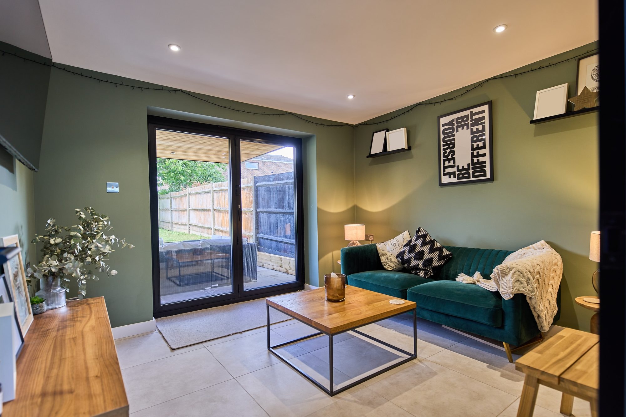 The finished snug, living room and bright hallway with a new rooflight at the Stevenage home by DNR Build (1 of 8)