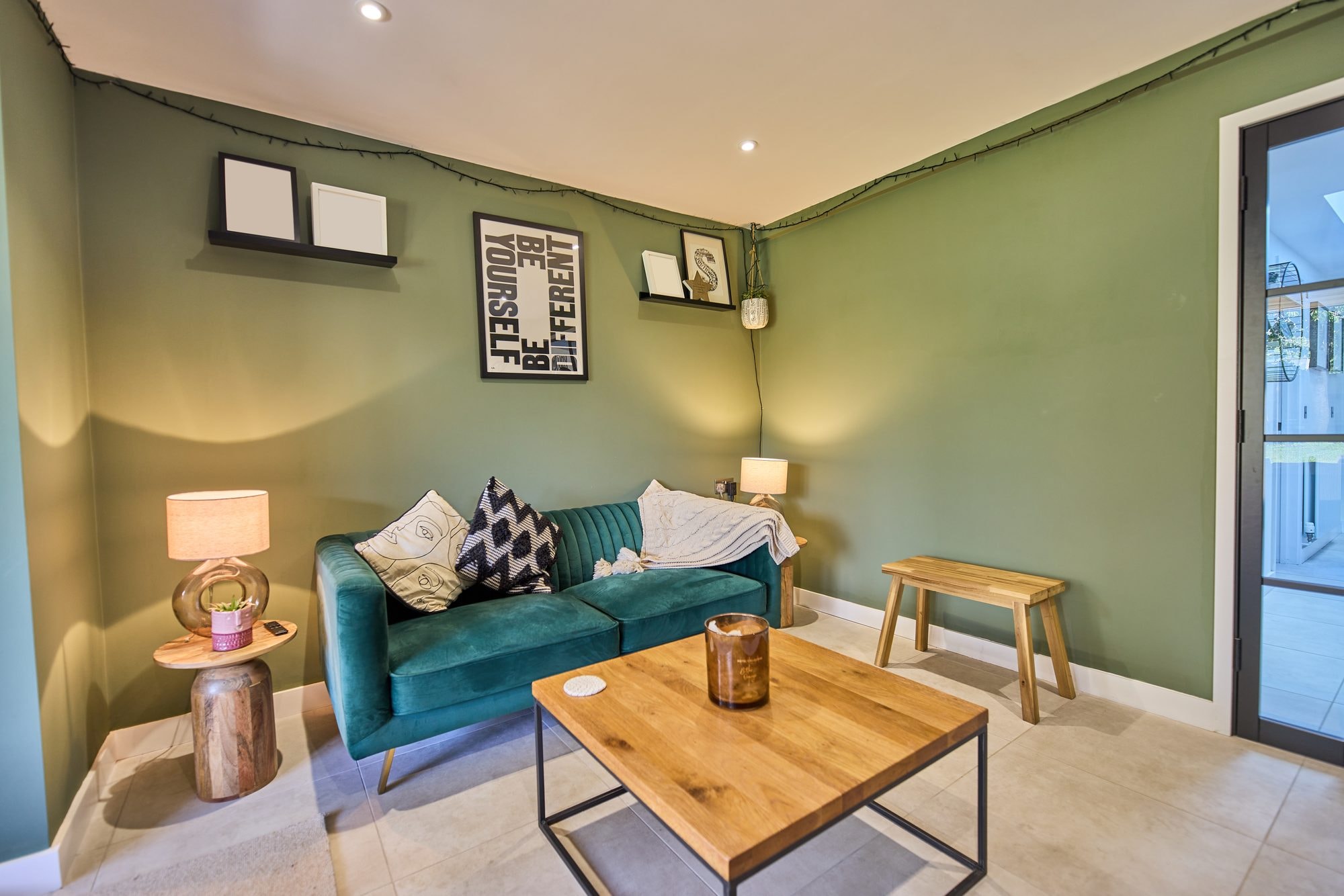 The finished snug, living room and bright hallway with a new rooflight at the Stevenage home by DNR Build (3 of 8)