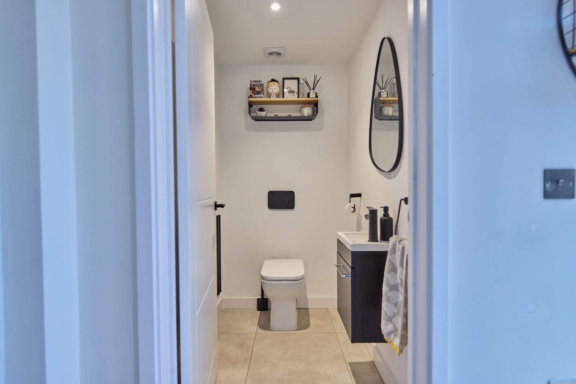 The finished bathrooms, cloakroom and utility room at the Stevenage home by DNR Build (10 of 13)