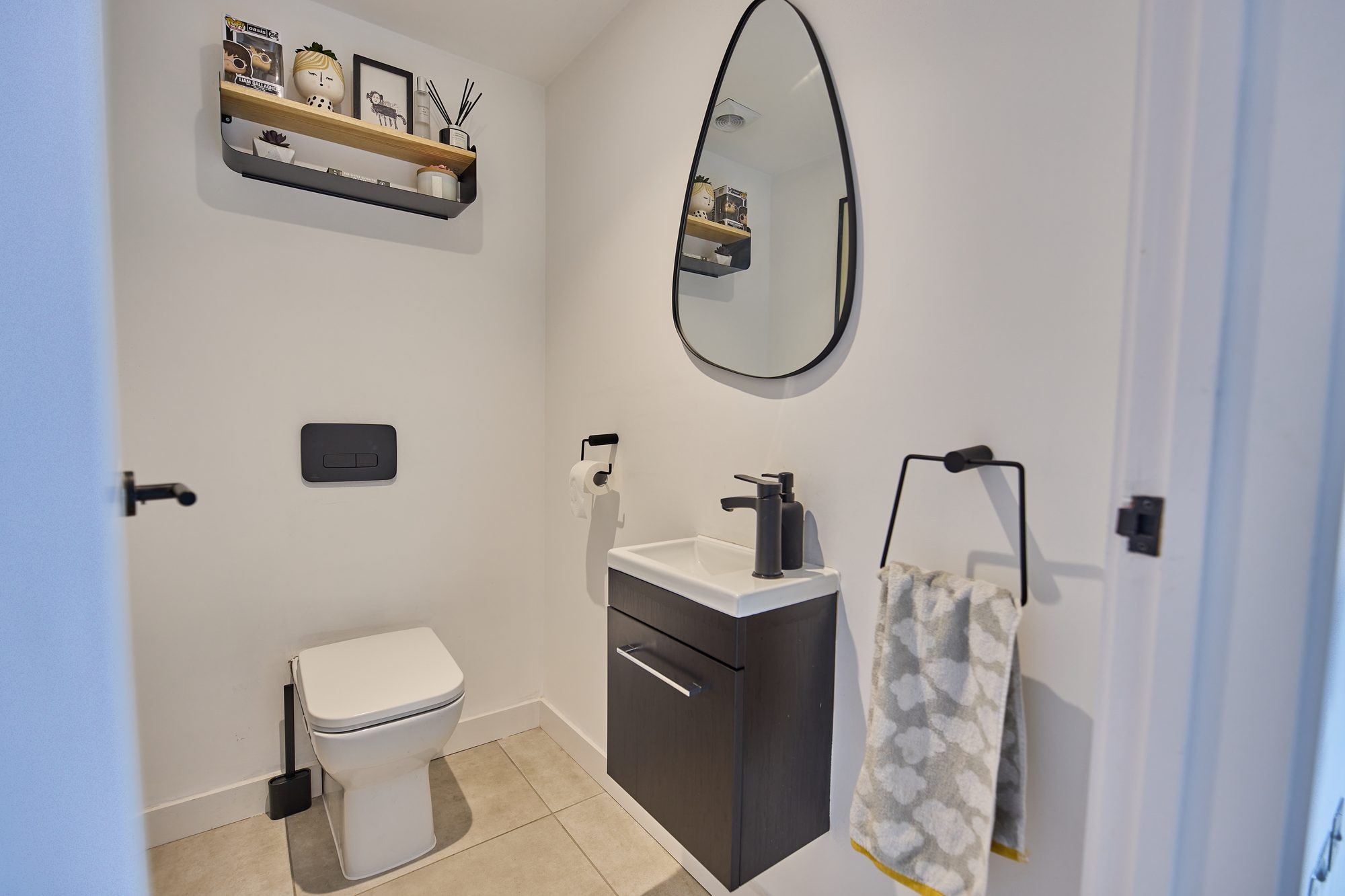 The finished bathrooms, cloakroom and utility room at the Stevenage home by DNR Build (11 of 13)