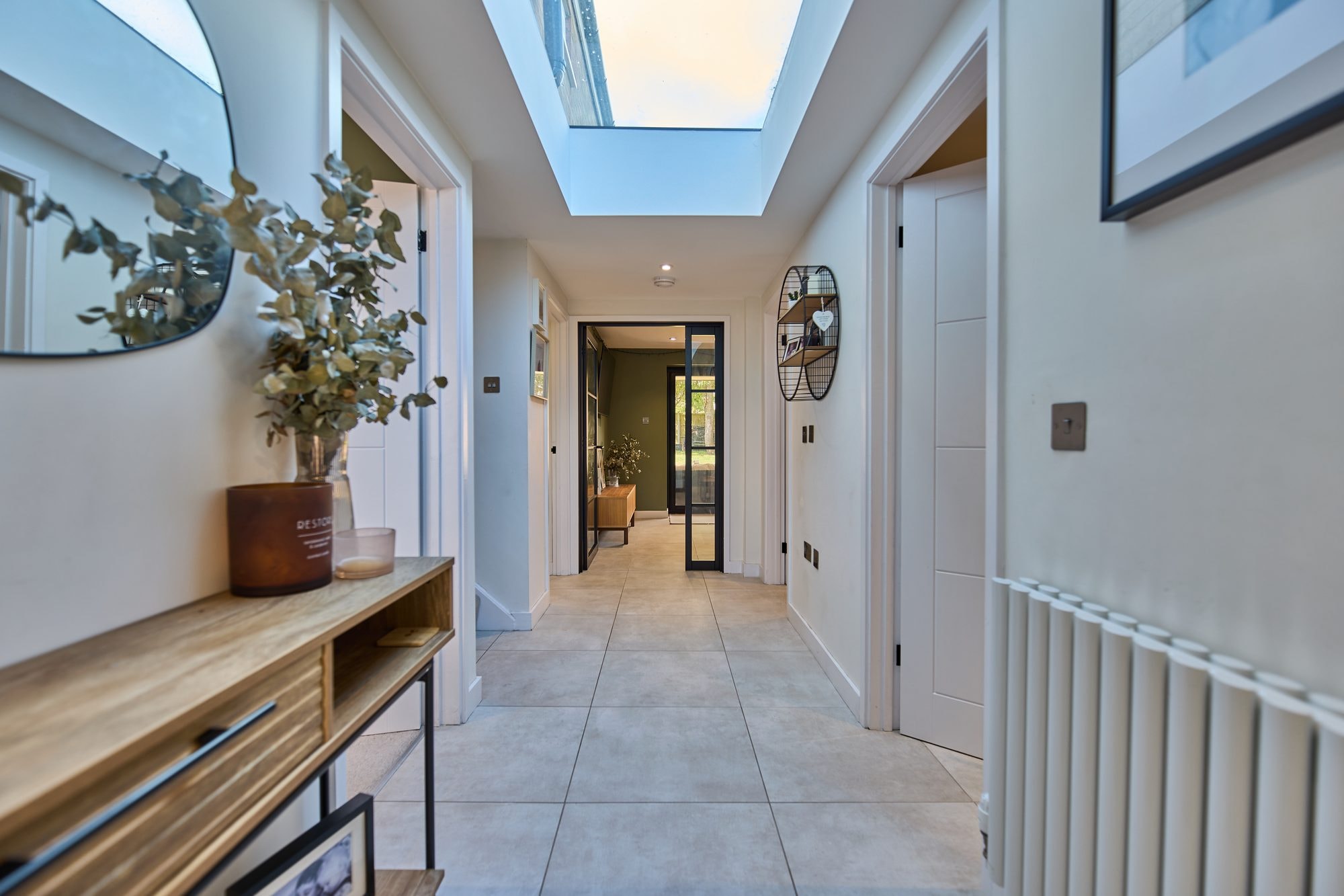 The finished snug, living room and bright hallway with a new rooflight at the Stevenage home by DNR Build (7 of 8)