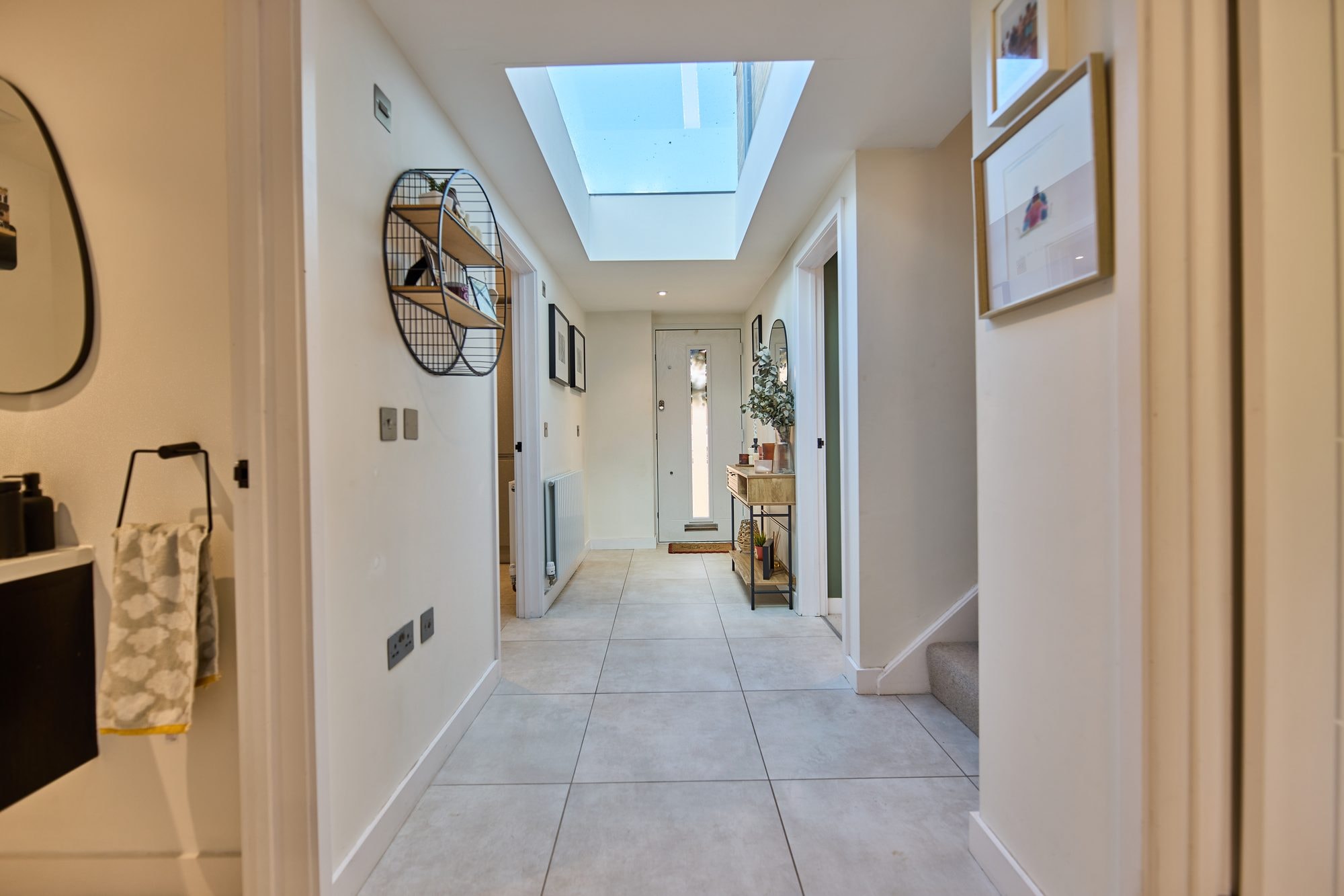 The finished snug, living room and bright hallway with a new rooflight at the Stevenage home by DNR Build (8 of 8)