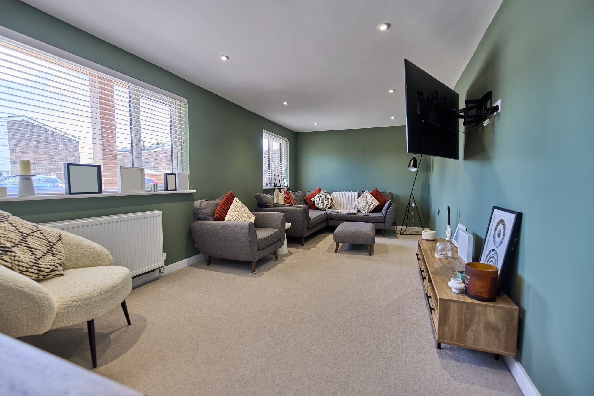 The finished snug, living room and bright hallway with a new rooflight at the Stevenage home by DNR Build (5 of 8)