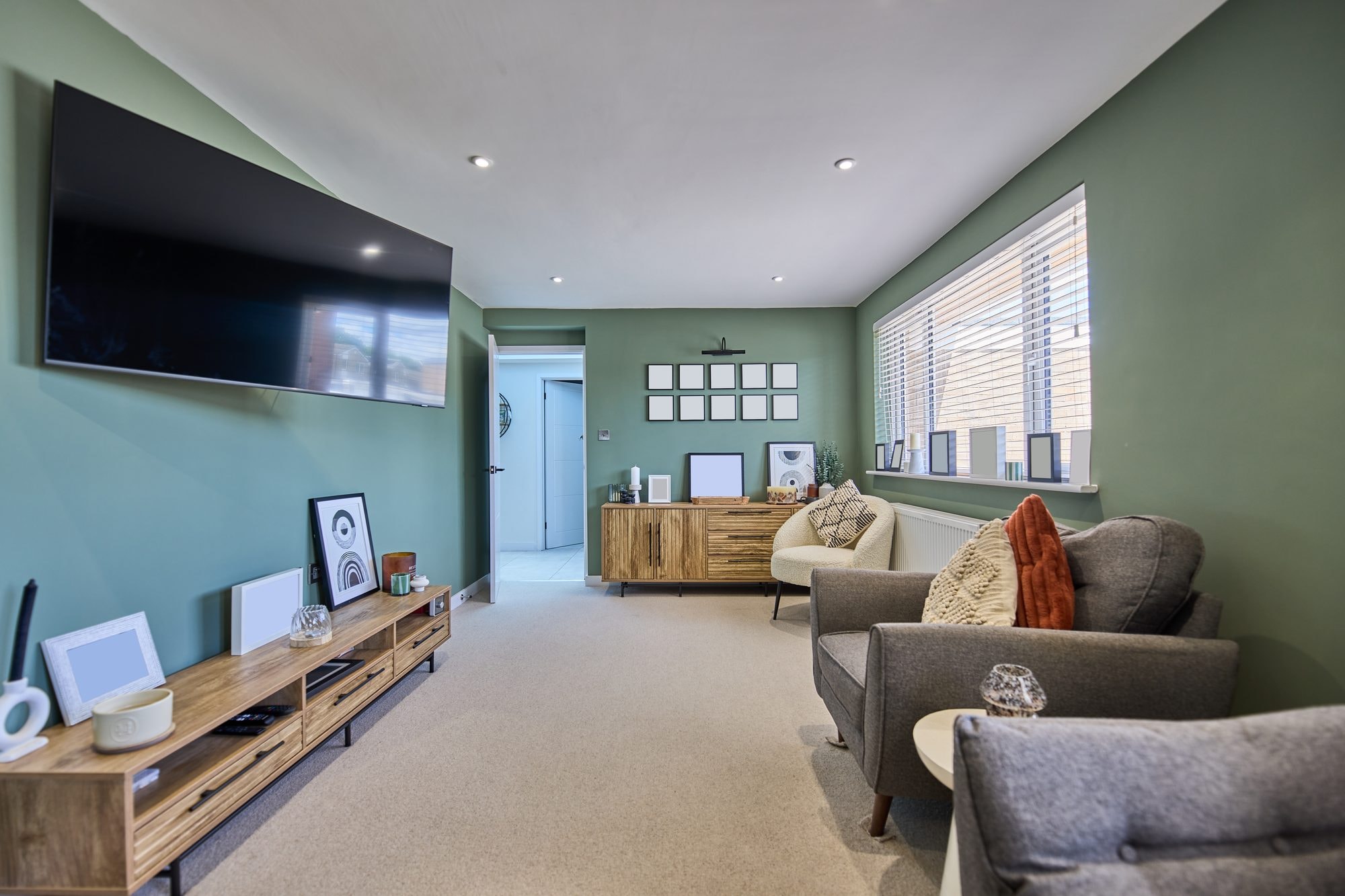 The finished snug, living room and bright hallway with a new rooflight at the Stevenage home by DNR Build (6 of 8)