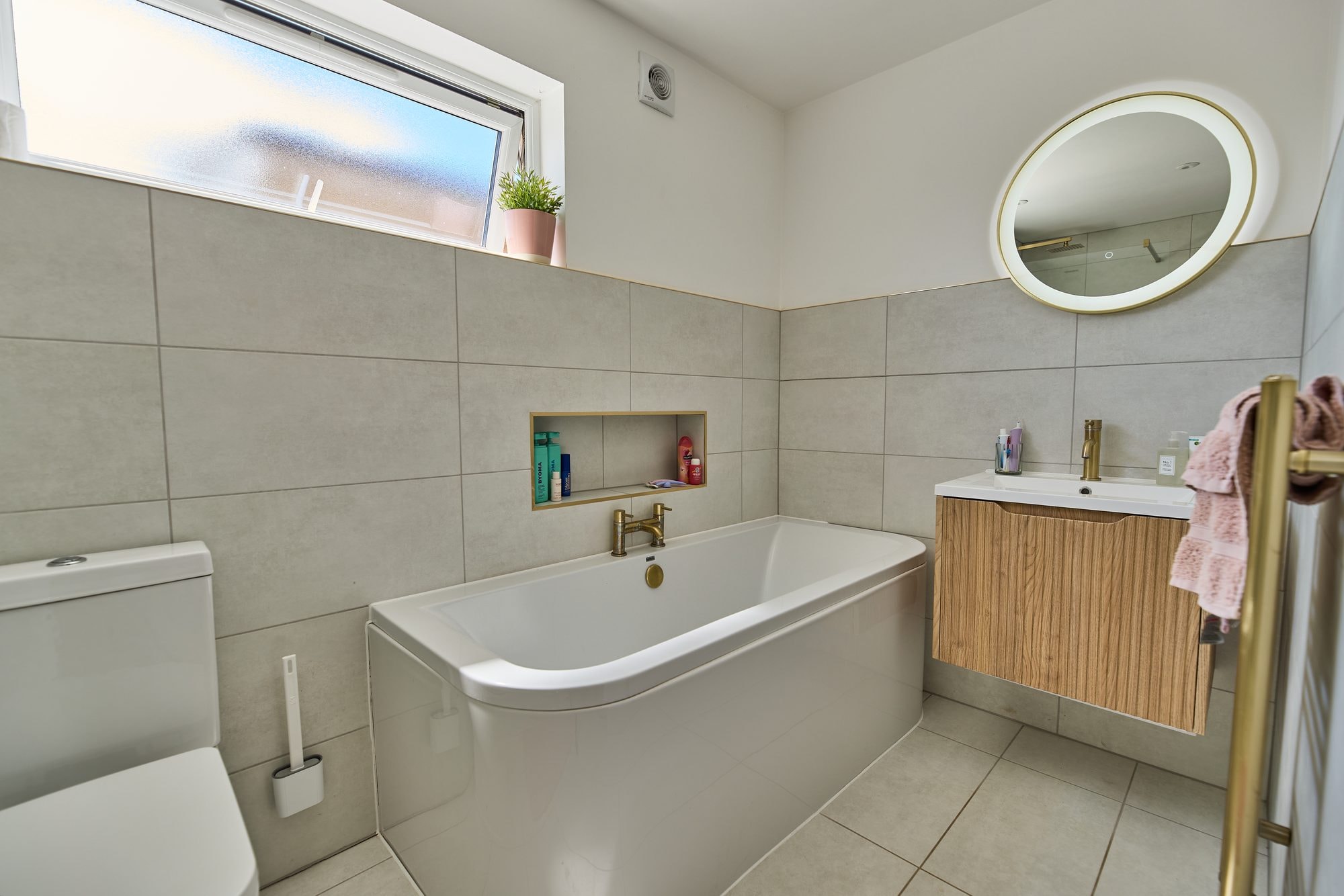 The finished bathrooms, cloakroom and utility room at the Stevenage home by DNR Build (1 of 13)