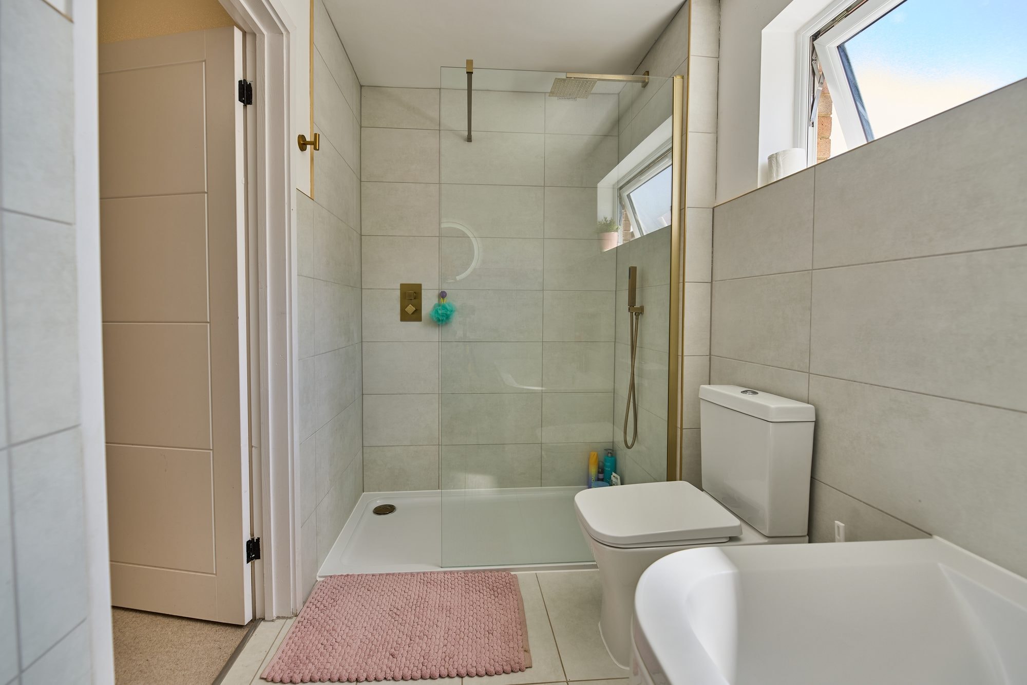 The finished bathrooms, cloakroom and utility room at the Stevenage home by DNR Build (3 of 13)