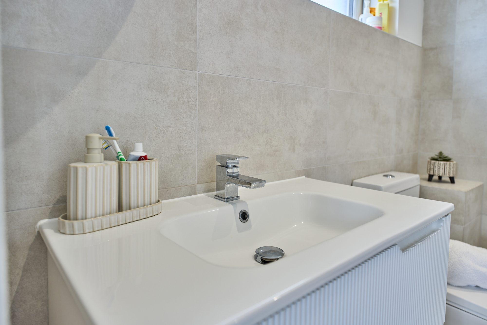 The finished bathrooms, cloakroom and utility room at the Stevenage home by DNR Build (8 of 13)
