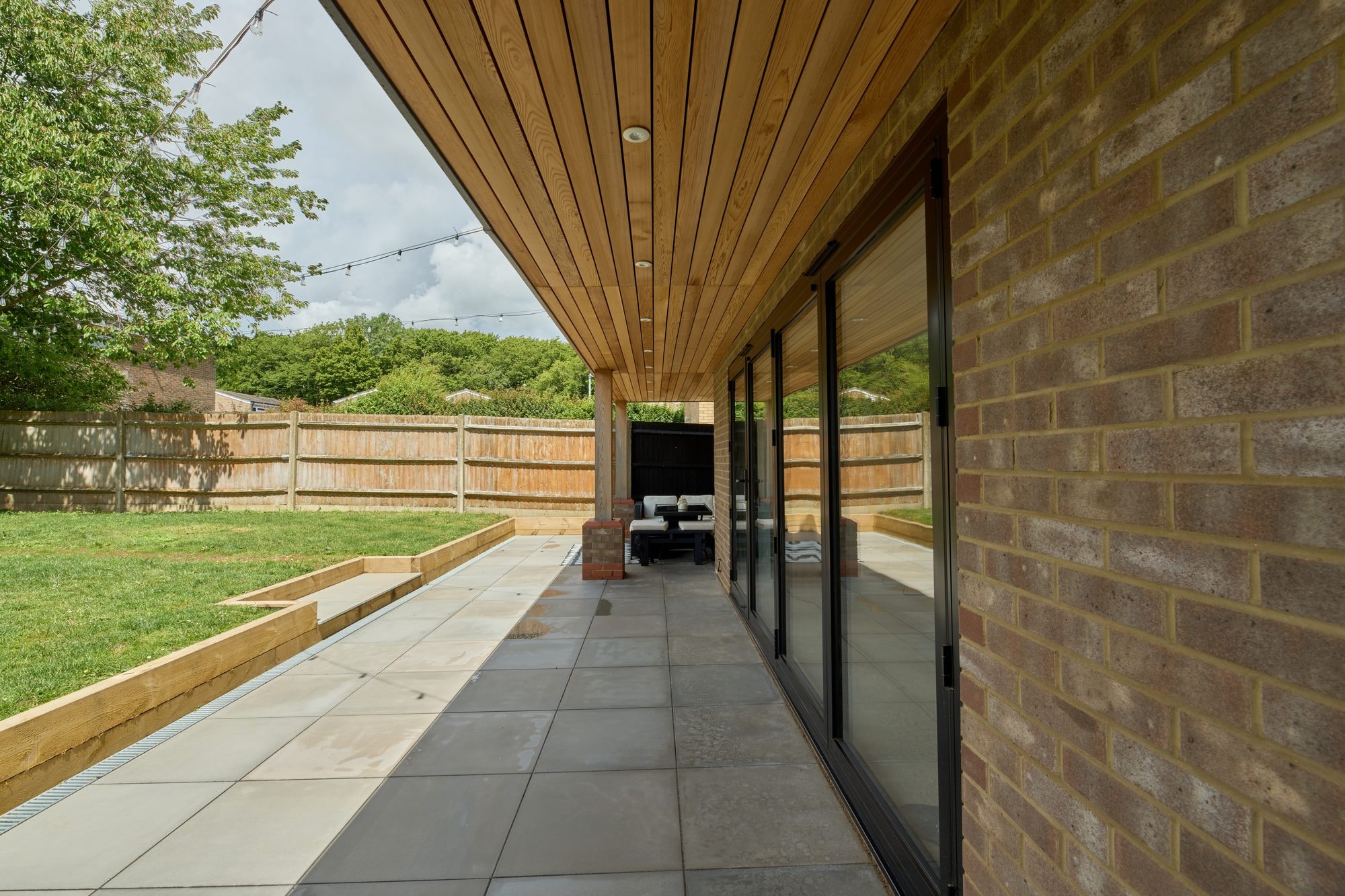 The finished cedar canopy, patio, garden and frontage at the Stevenage home by DNR Build (4 of 15)
