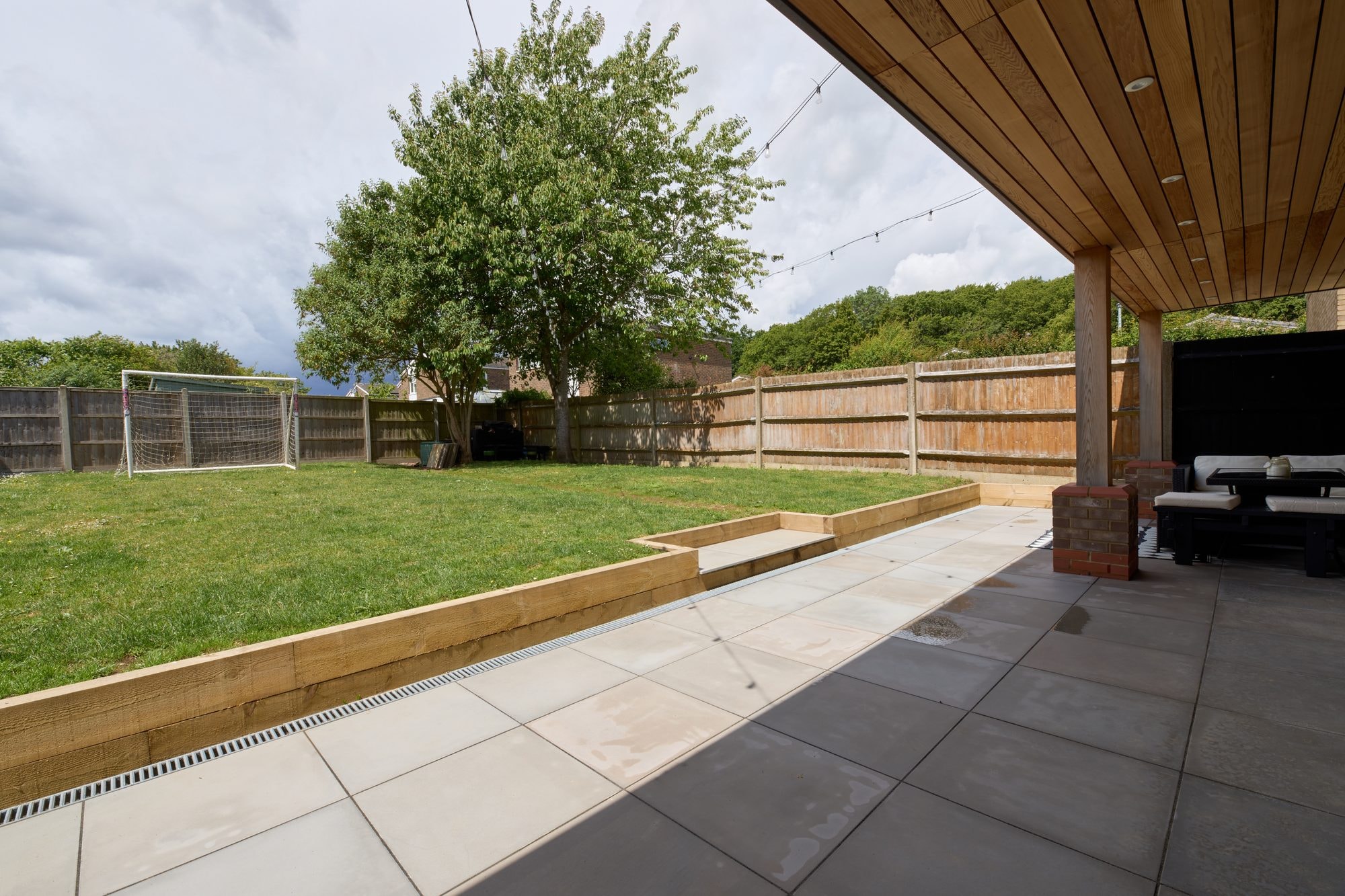 The finished cedar canopy, patio, garden and frontage at the Stevenage home by DNR Build (6 of 15)