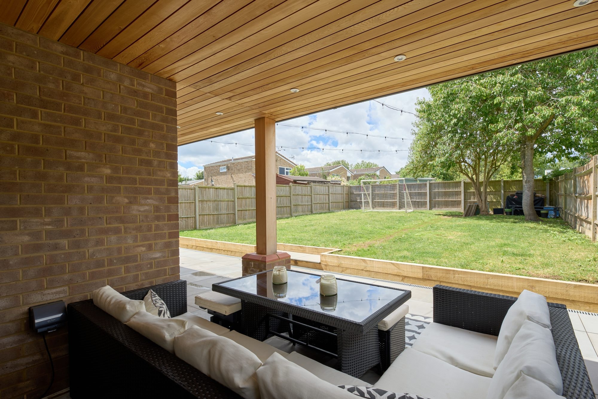 The finished cedar canopy, patio, garden and frontage at the Stevenage home by DNR Build (8 of 15)