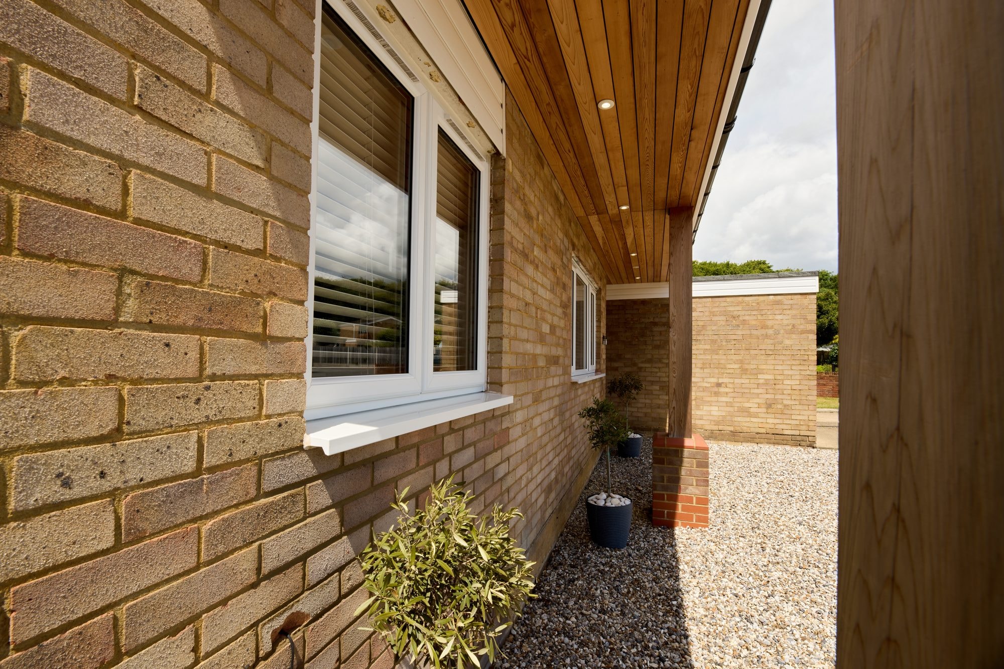 The finished cedar canopy, patio, garden and frontage at the Stevenage home by DNR Build (10 of 15)