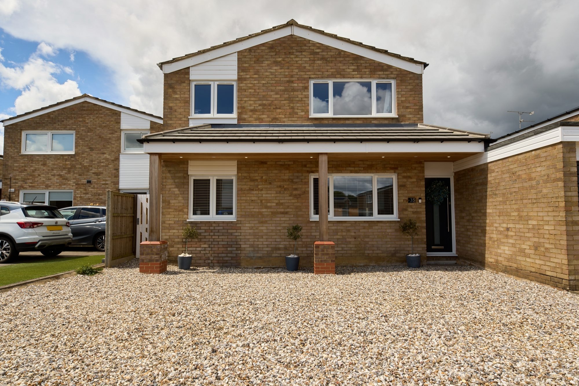 The finished cedar canopy, patio, garden and frontage at the Stevenage home by DNR Build (12 of 15)