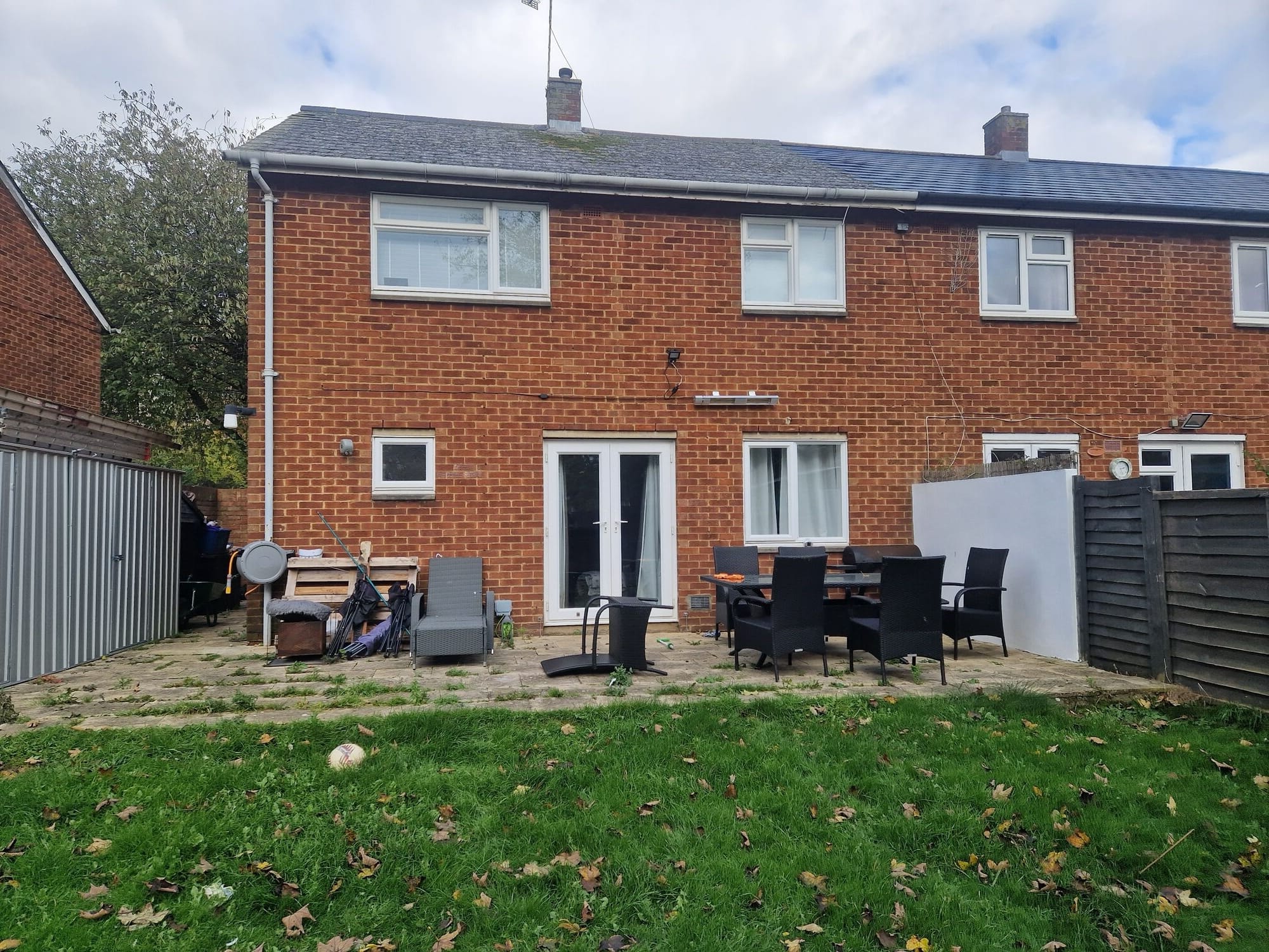 The rear of the semi-detached house and garden before the single storey extension by DNR Build