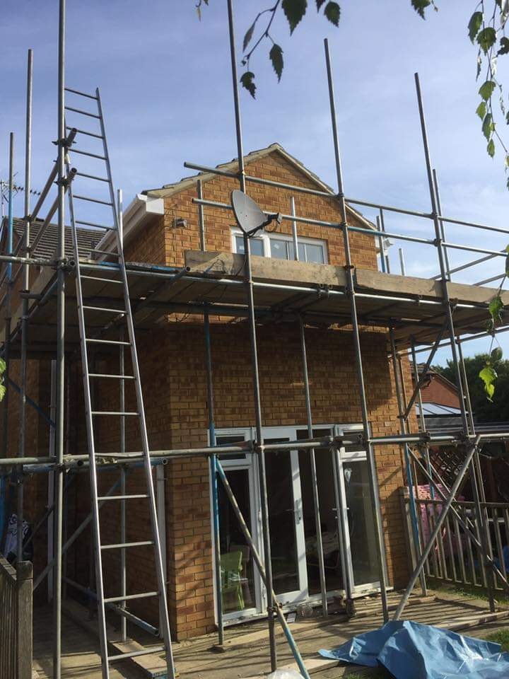The new upper storey brickwork and gable complete on the scaffold by DNR Build