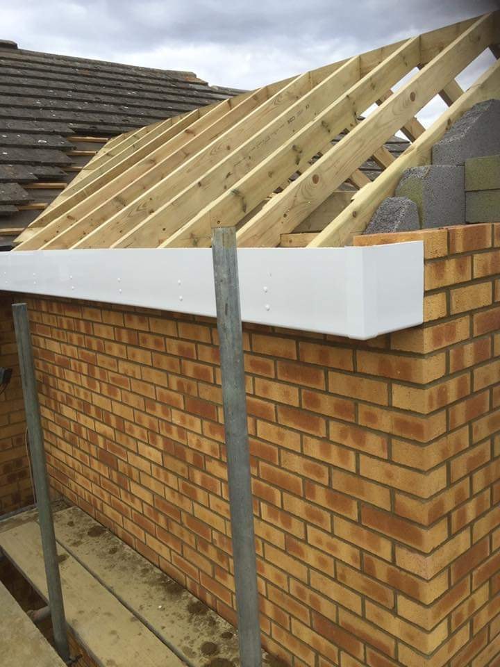 New timber rafters framing the pitched roof over the upper storey extension by DNR Build