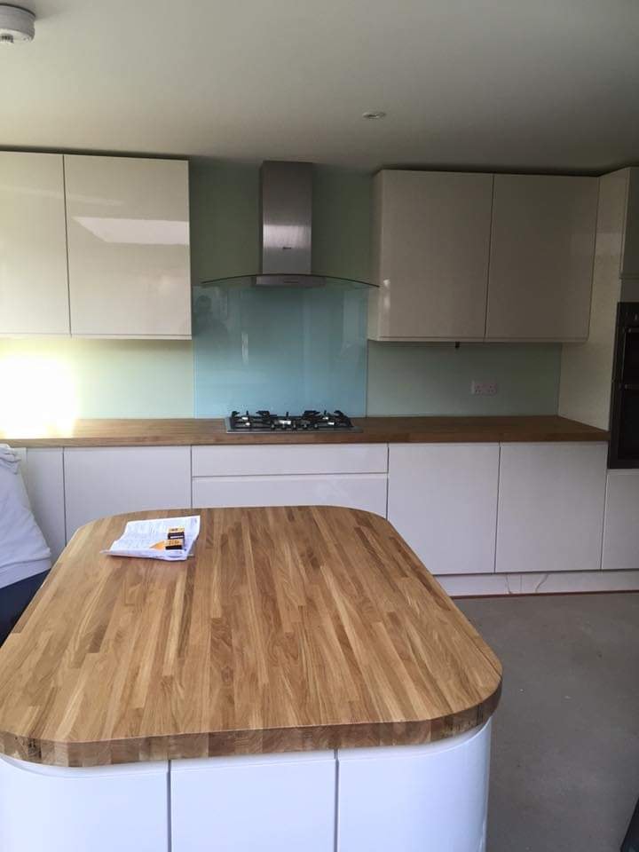 The new kitchen island with an oak block worktop taking shape during the fit out by DNR Build